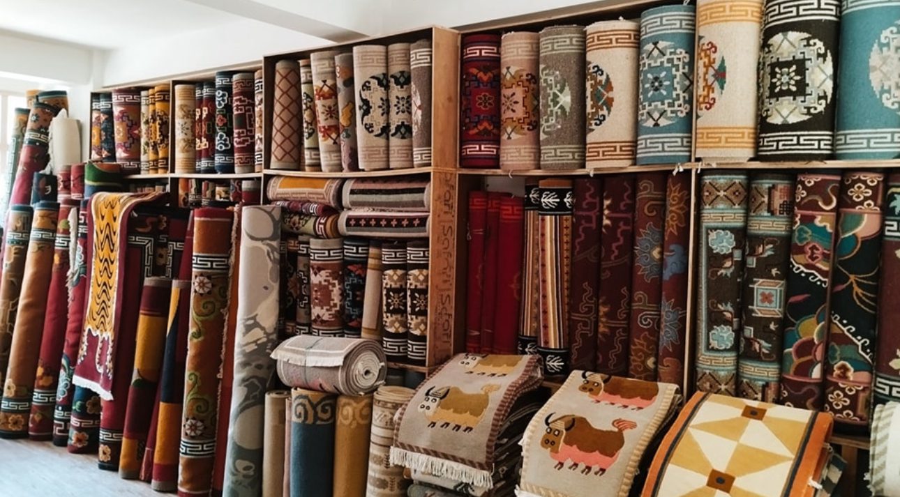 Rolls of hand-knotted Nepali carpets in a Kathmandu showroom